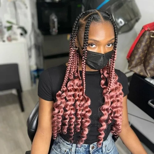 Coi Leray braids with dark brown and mauve kanekalon