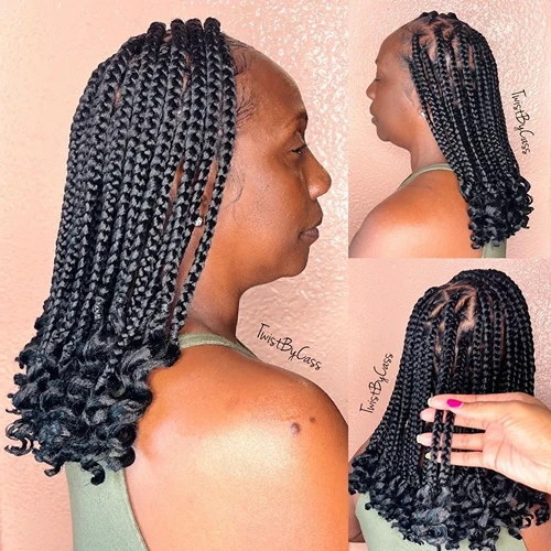 Medium Coi Leray Braids with free-style parts