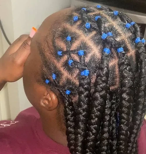 Criss Cross Knotless Braids with Blue Rubber Bands