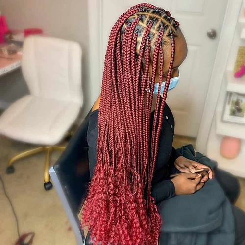 Red Braids with Curly Ends