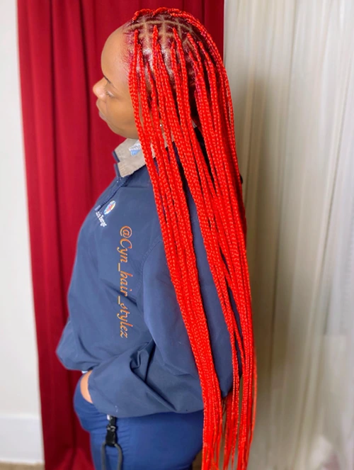 Red knotless womanly & modern braids