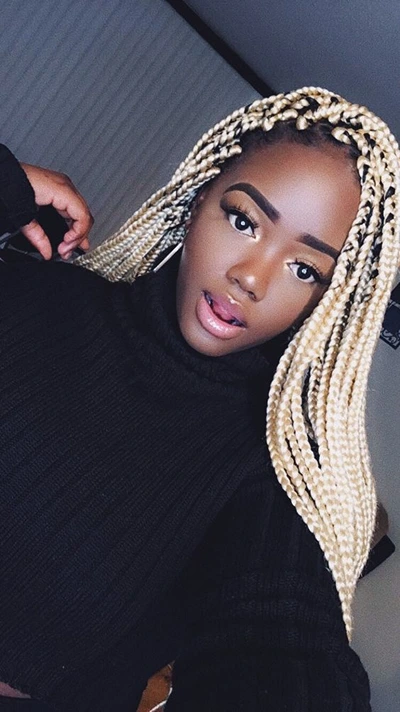 blonde knotless braids on dark skin