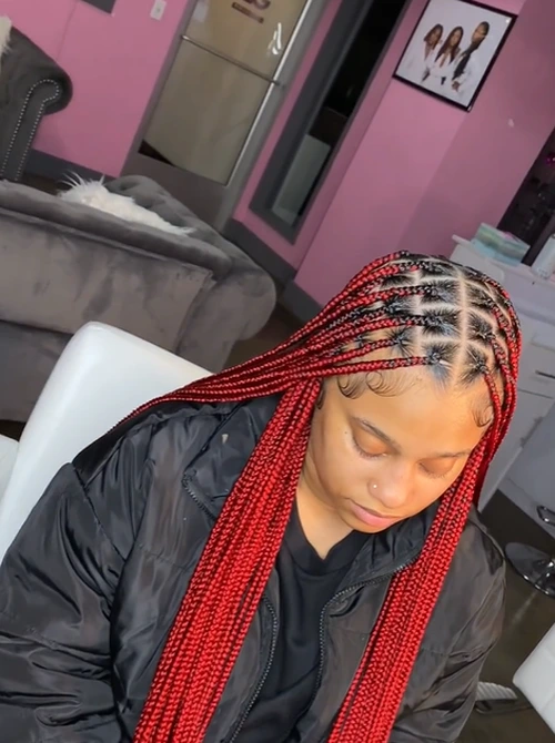 medium red knotless braids