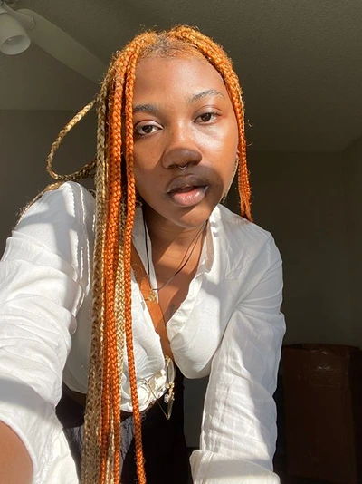 orange and blonde knotless braids