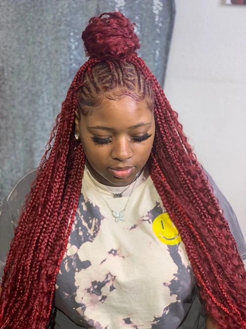 red knotless braids on dark skin